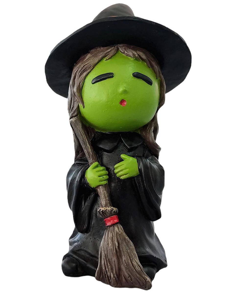 Figura decorativa con forma de bruja